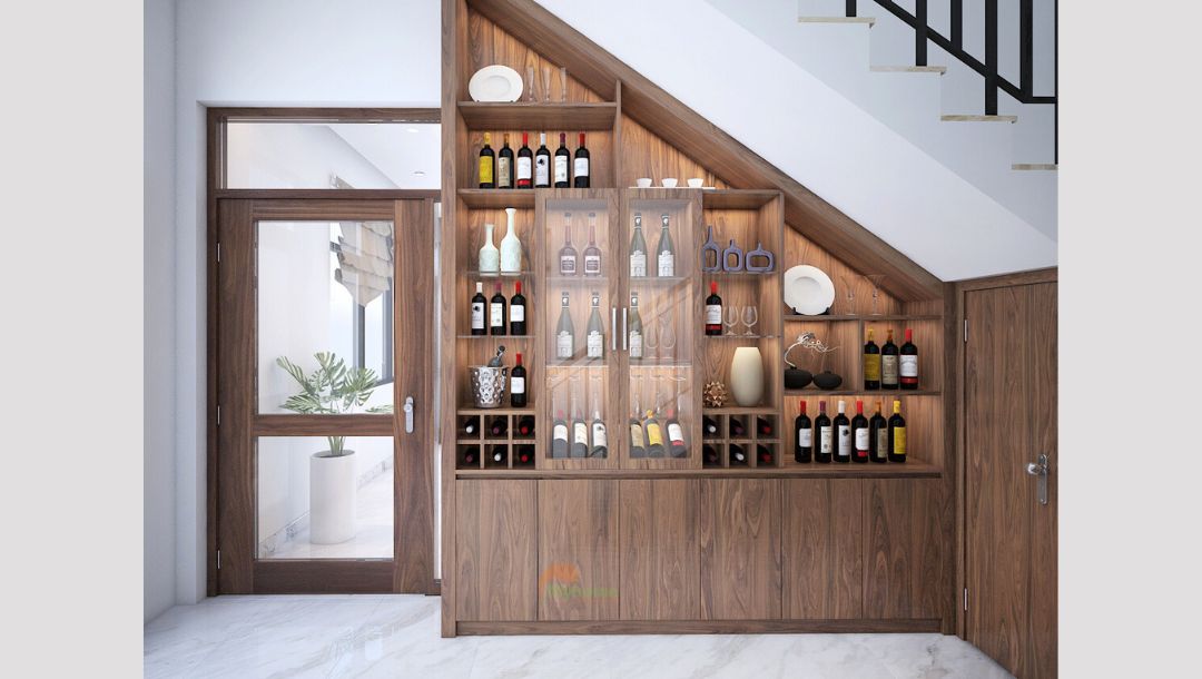 Không ngoại lệ, tủ rượu cũng được thiết kế tại vị trí gầm cầu thang. Với nét mộc mạc của gỗ MDF màu gỗ. Gia chủ thoải mái lựa chọn phong cách cho riêng mình