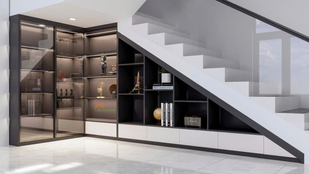 Góc tủ cầu thang được tận dụng làm giá kệ trang trí rộng rãi kết hợp tủ rượu decor thẩm mỹ