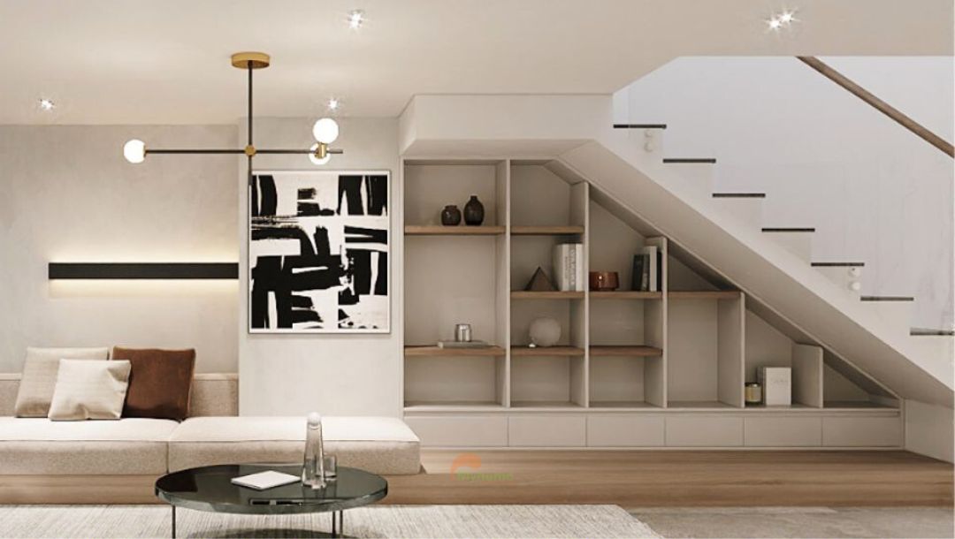 Thiết kế giá sách, kệ trang trí dưới gầm cầu thang. Đây cũng là nơi decor cho phòng khách sang trọng