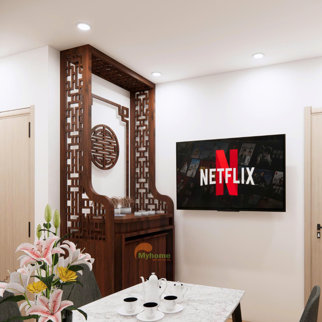 Sử dụng vách gỗ hoa văn truyền thống giúp phân tách không gian hiệu quả mà vẫn đảm bảo sự thông thoáng.